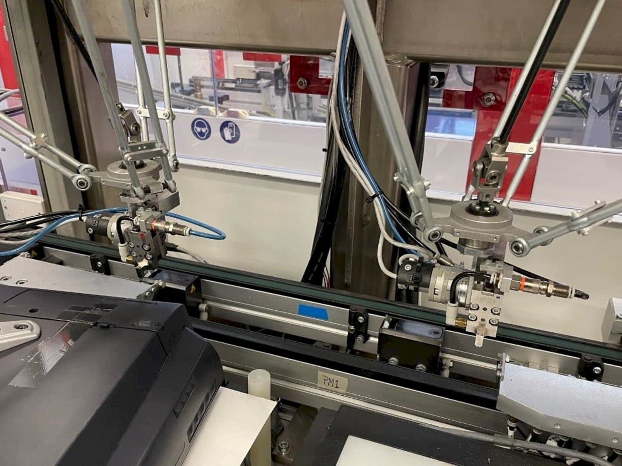 Widok z przodu maszyny IMS Tattoo Assembly Line