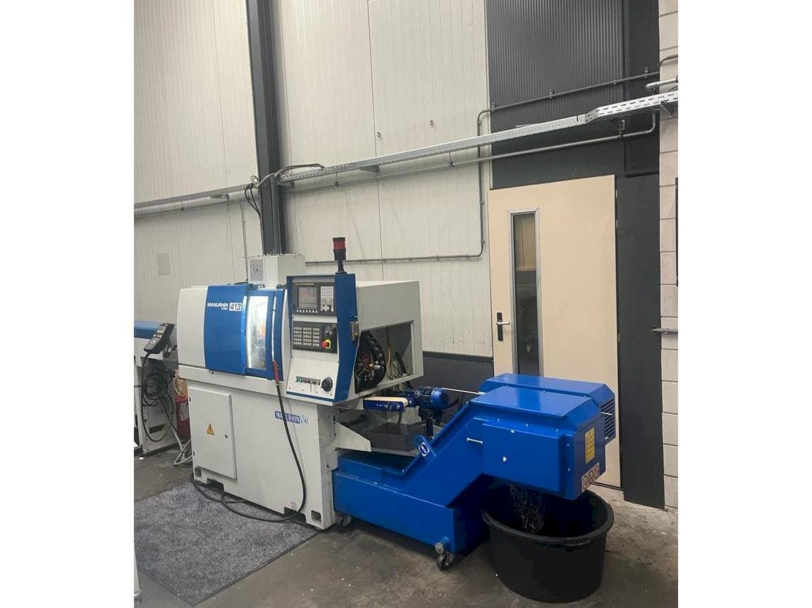 Widok z przodu maszyny Manurhin K'MX 413