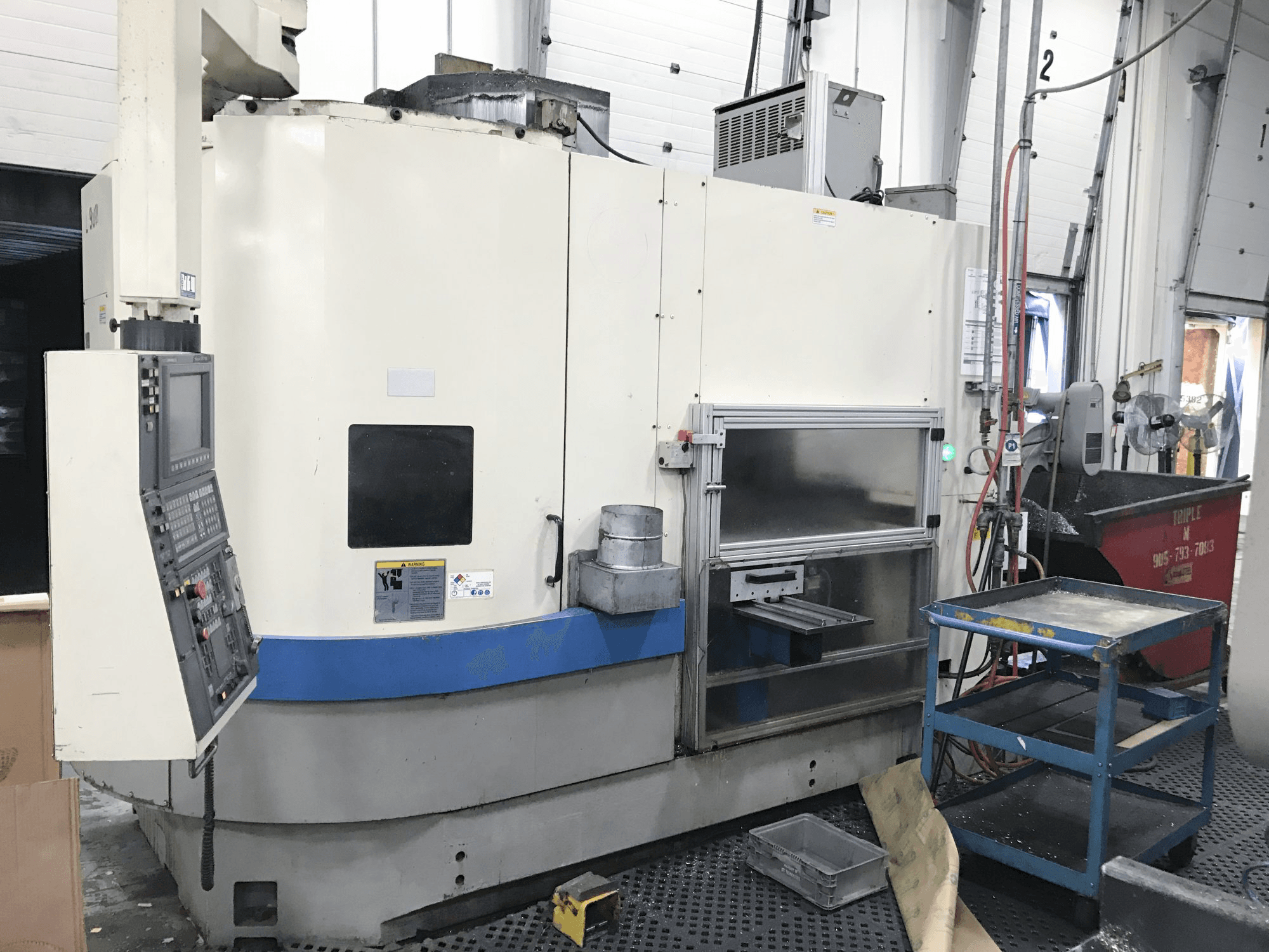 Widok z lewej maszyny Okuma LVT 400