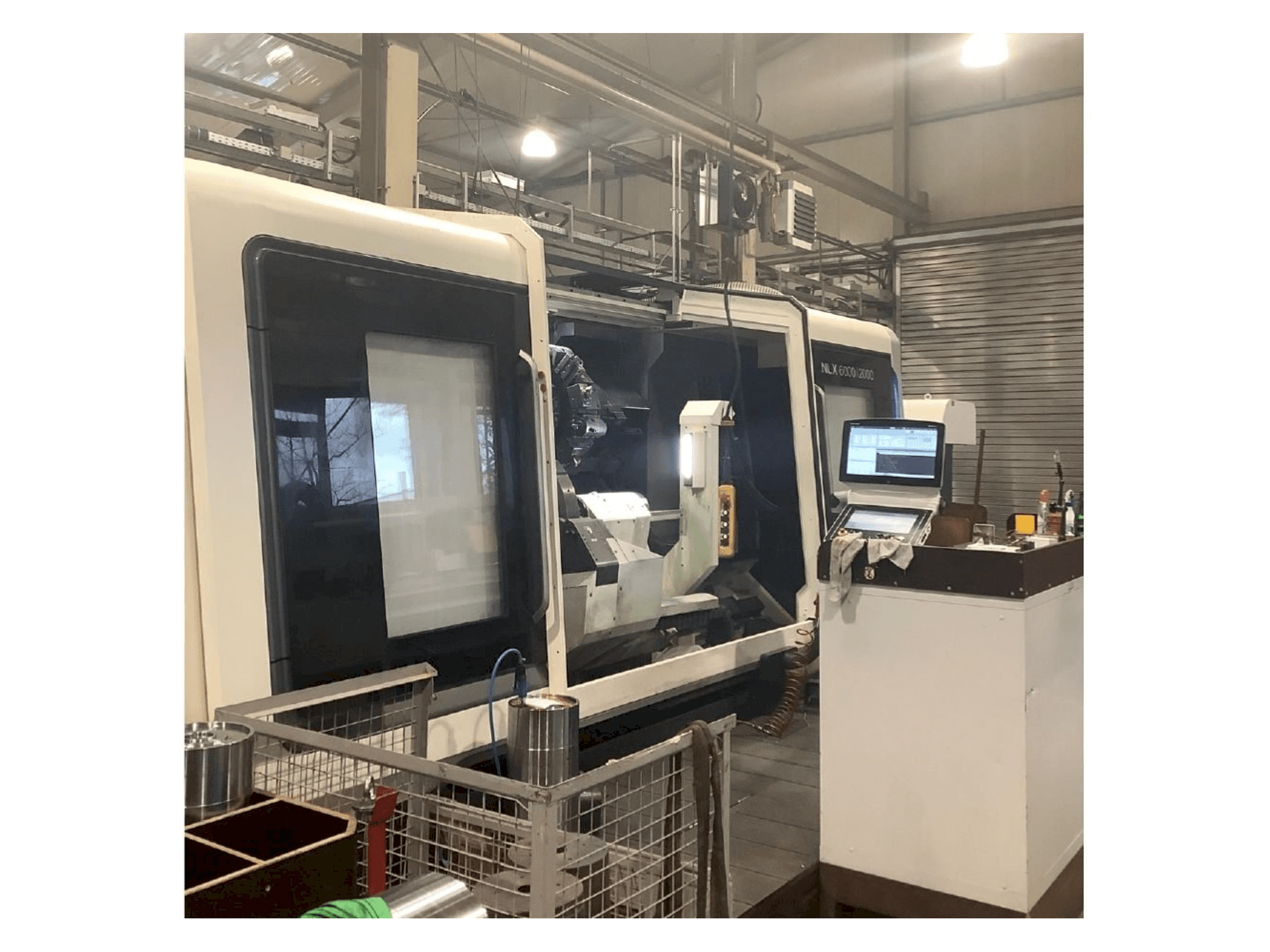 Widok z przodu maszyny DMG MORI NLX 6000 | 2000