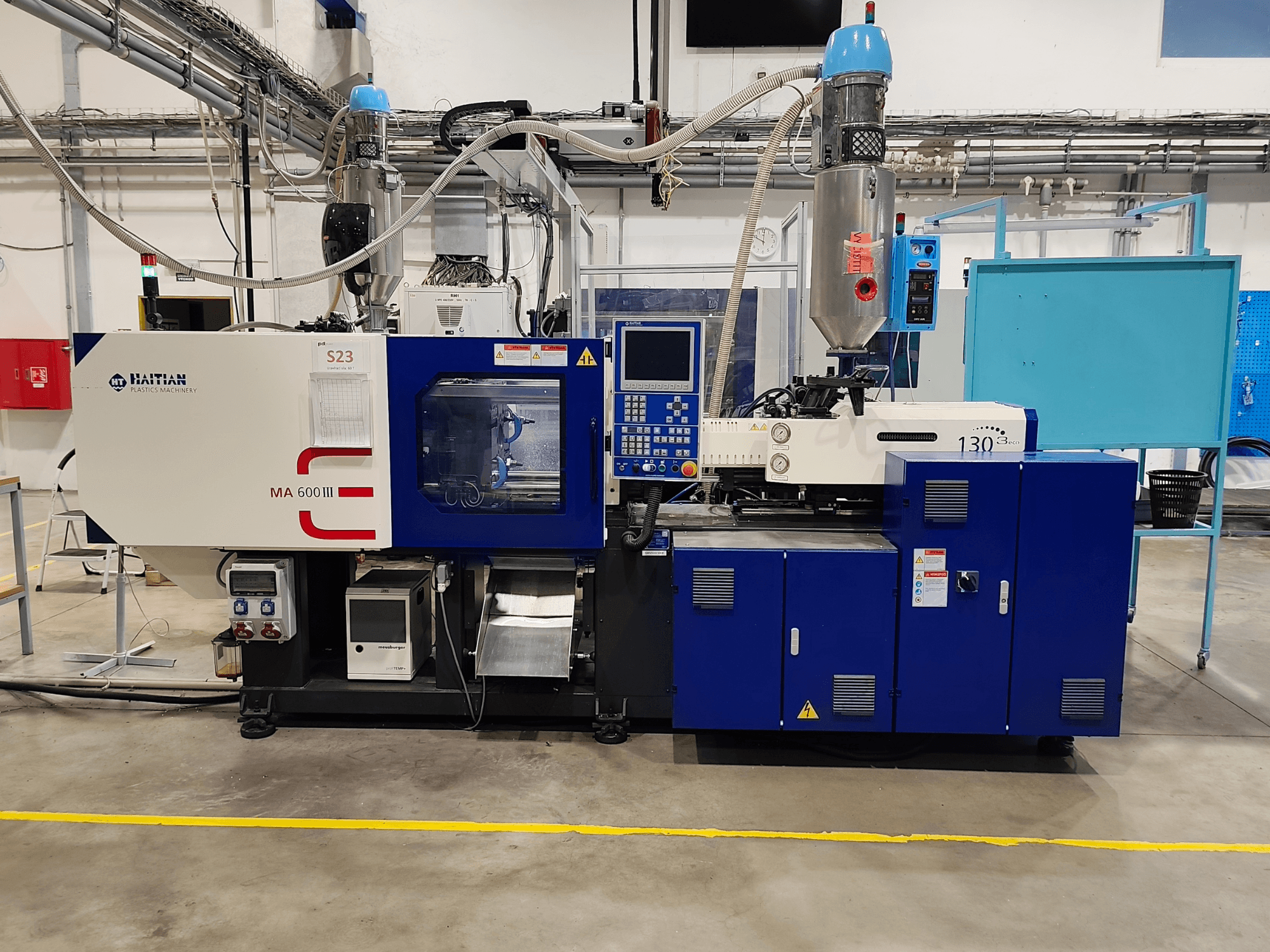 HAITIAN Mars III MA 600/130B eco – elektryczna wtryskarka, widok z przodu przedstawiający panel sterowania i zespół wtryskowy.