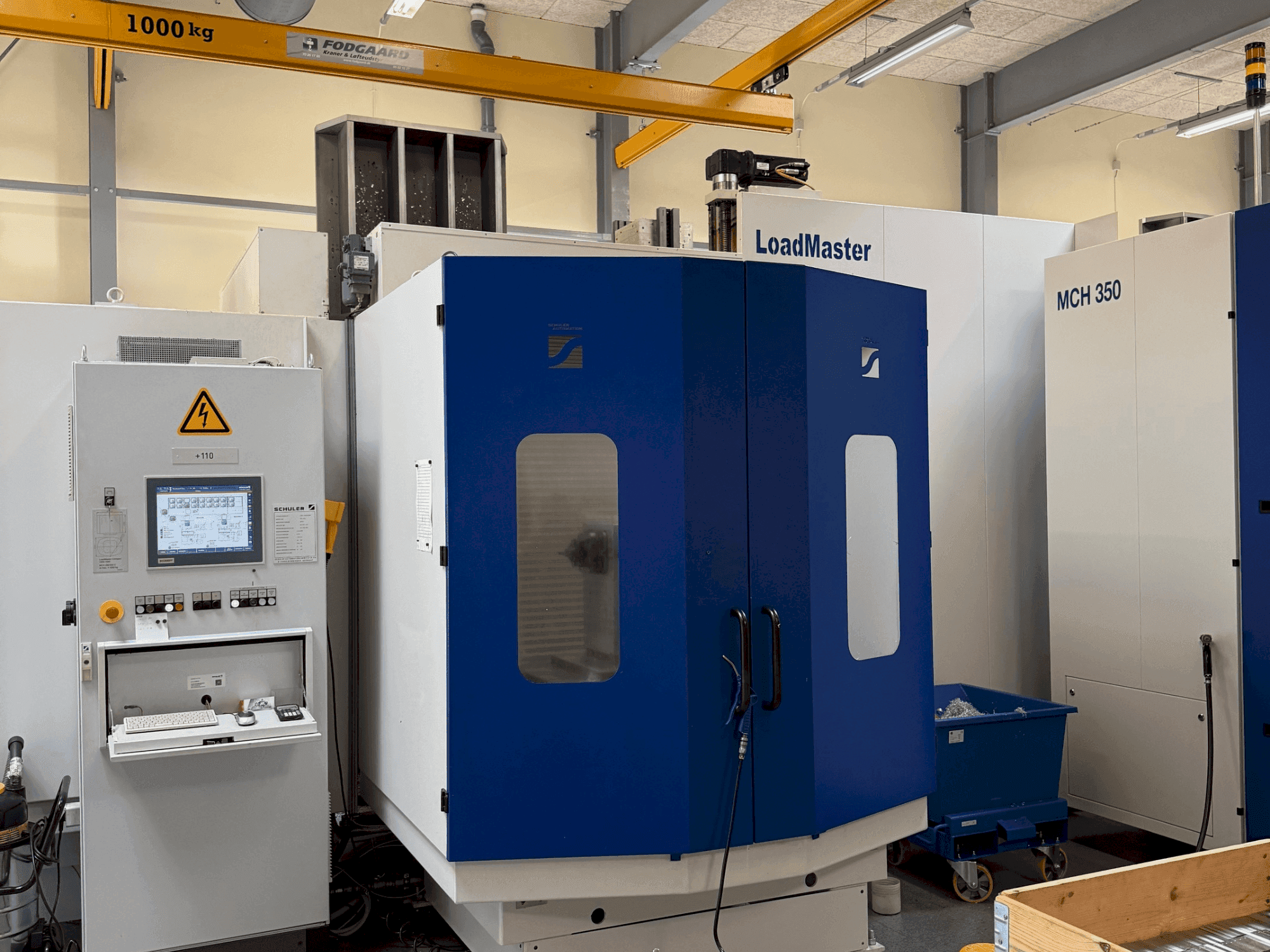 Widok z przodu maszyny HELLER MCH 300 + MCH 300 C + 22 pallet system